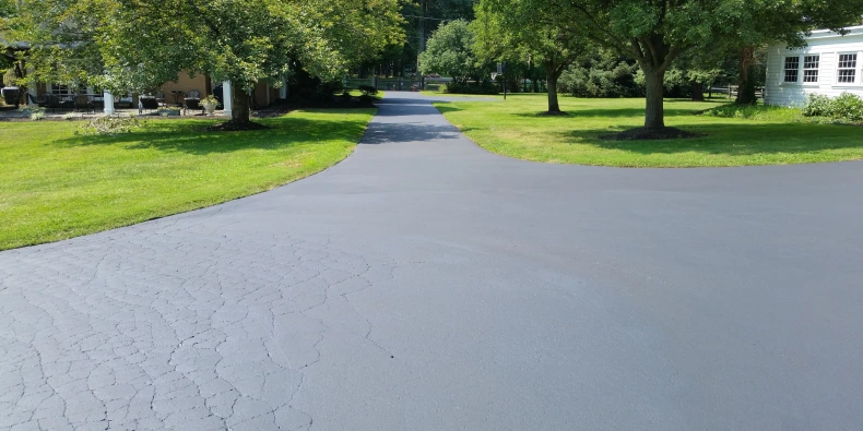t: asphalt care with sealcoating